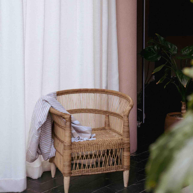 Rattan Kids Malawi chair with throw